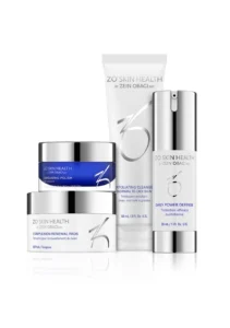 Four ZO Skin Health skincare products, including a cleanser, exfoliating polish, renewal pads, and daily power defense, arranged in a clean, white setting.